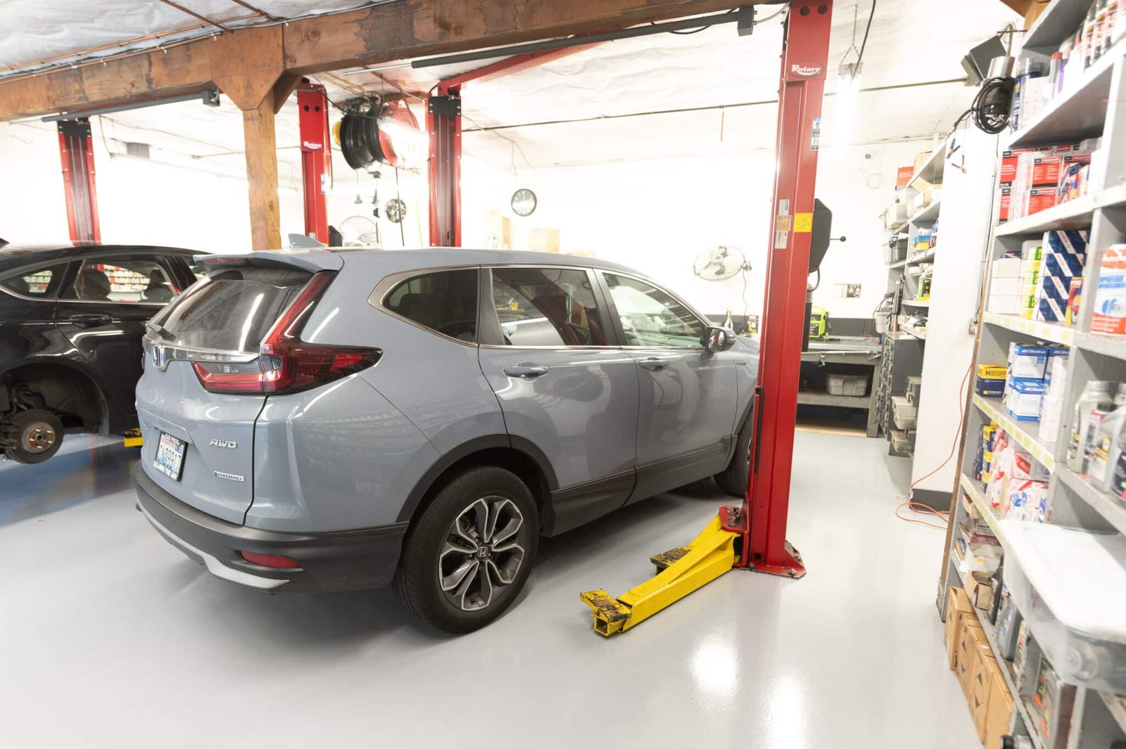 Honda CR-V inside Chuck’s Auto Repair – North Seattle for maintenance service.