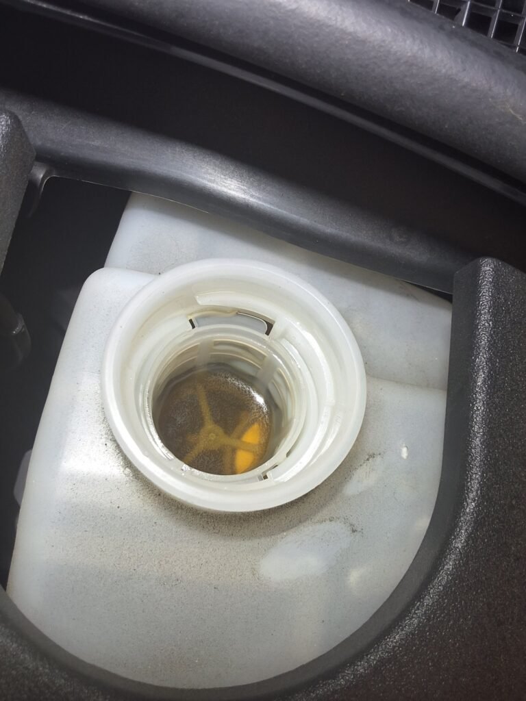 Brake fluid reservoir inspected on a 2015 Lexus RX450h during its 90,000 mile maintenance visit.